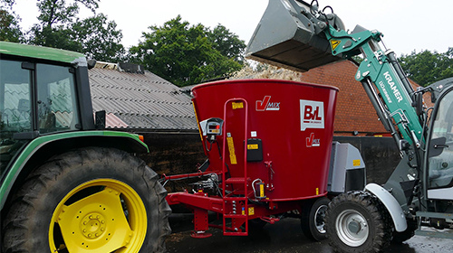 Attached feed mixer